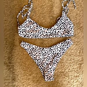 Zaful Dalmatian/cow print bikini . Size medium but fits like a small .